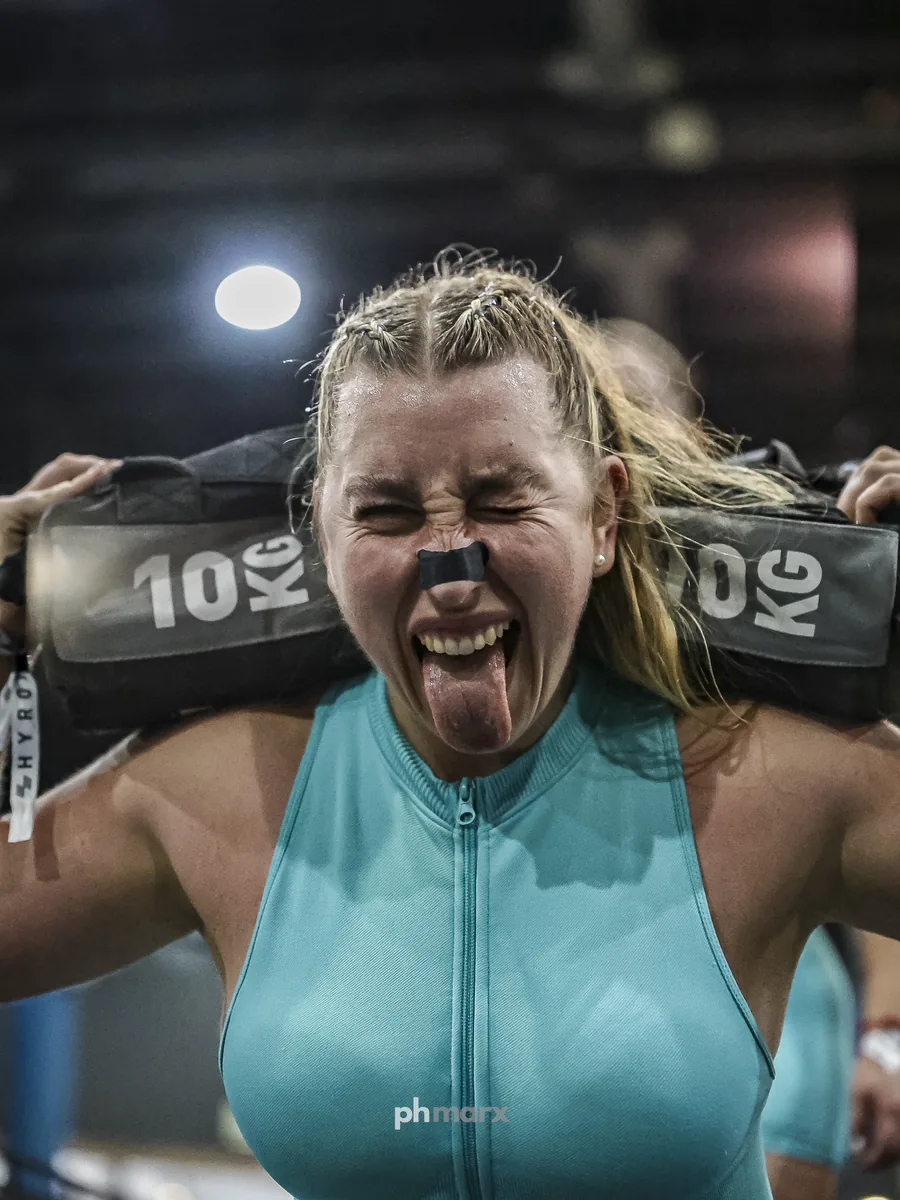 PH Marx fotografando o esforço de atleta híbrido no HYROX em São Paulo